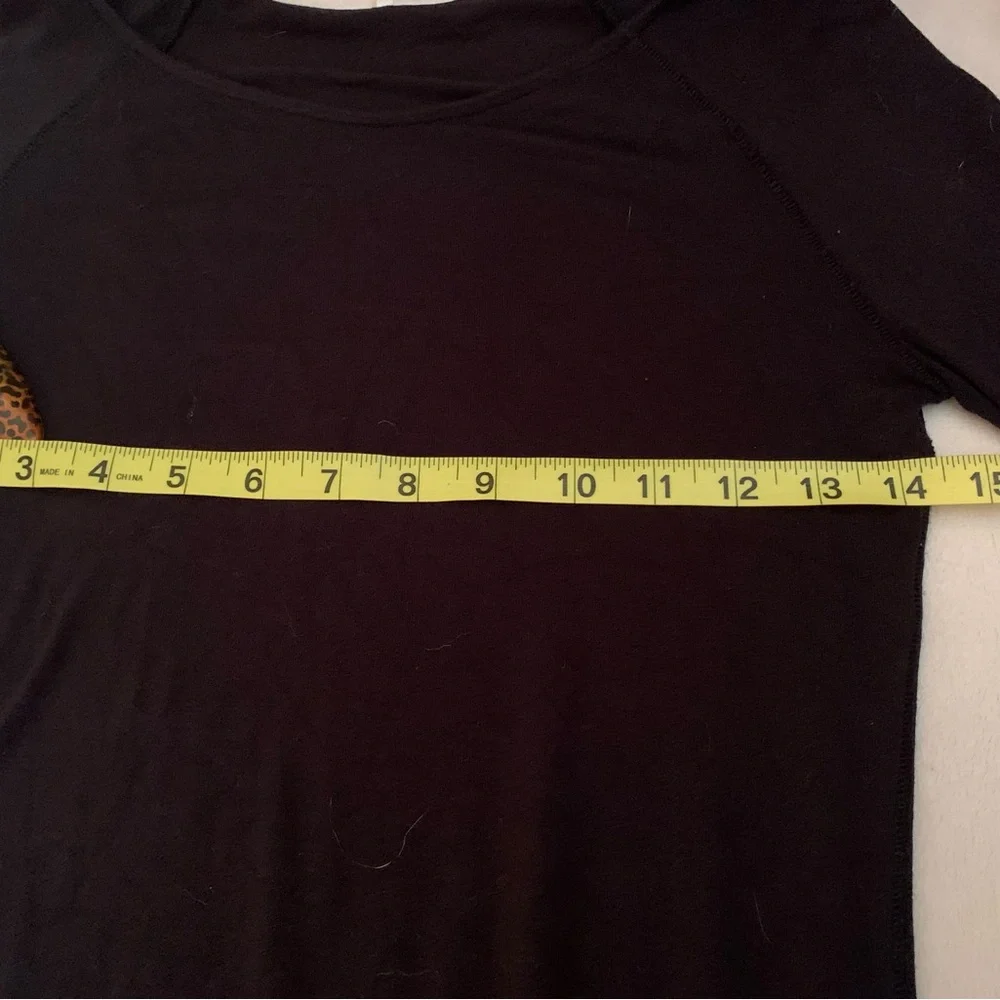 FREE PEOPLE ladies 95% rayon black “To the Tropics” size medium, long sleeve top